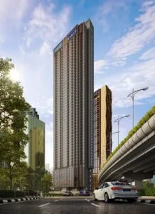 Exterior road view of Phoeniz Suites @ KLCC, showing the high-rise tower facade and surrounding Kuala Lumpur city environment.